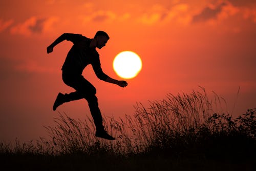 Man Silhouette with Sun behind