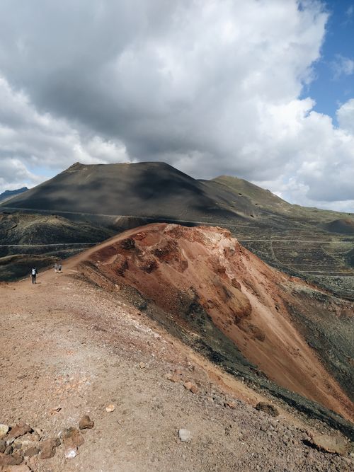 Free Scenic view of volcanic terrain and mountains in CN, Spain, ideal for adventure and nature enthusiasts. Stock Photo