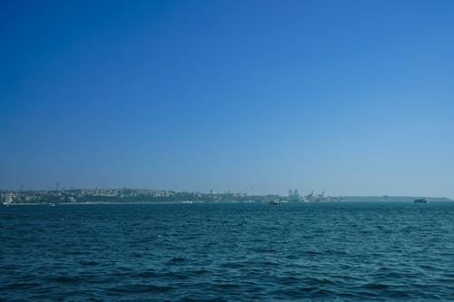 City Skyline seen from across the Bosporus under a Clear, Blue Sky 