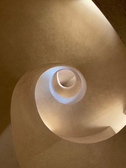 Free Elegant spiral staircase showcasing modern architecture in Indonesia. Stock Photo