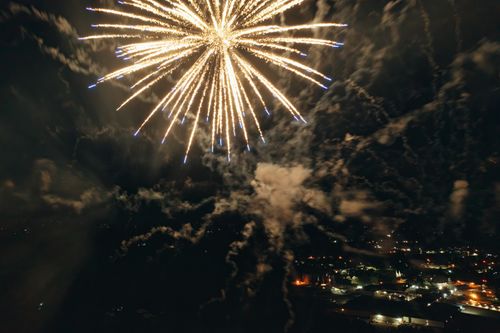 Free A breathtaking aerial view of fireworks illuminating the night sky over Plainview, Minnesota. Stock Photo