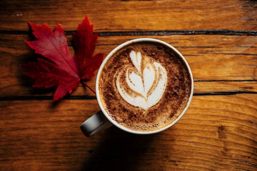 Free White Ceramic Mug With Heart Shaped Coffee Stock Photo