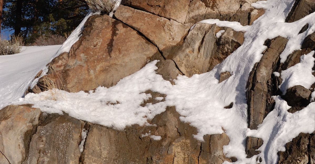 Snowy Rocks Background A Big Rock with Snow ยท Free Stock Photo