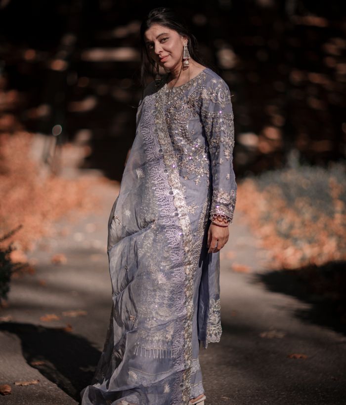 Woman modelling traditional Indian outfit