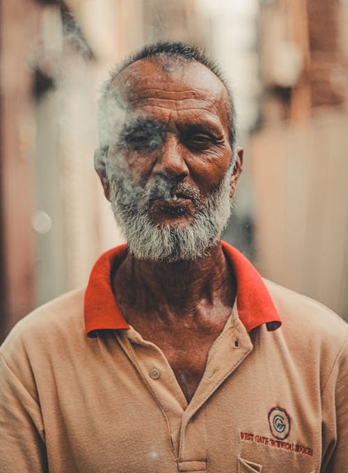 Elderly Man with Beard in Close Up Photography
