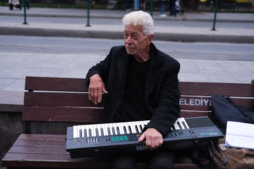 An Elderly Man With a Keyboard 