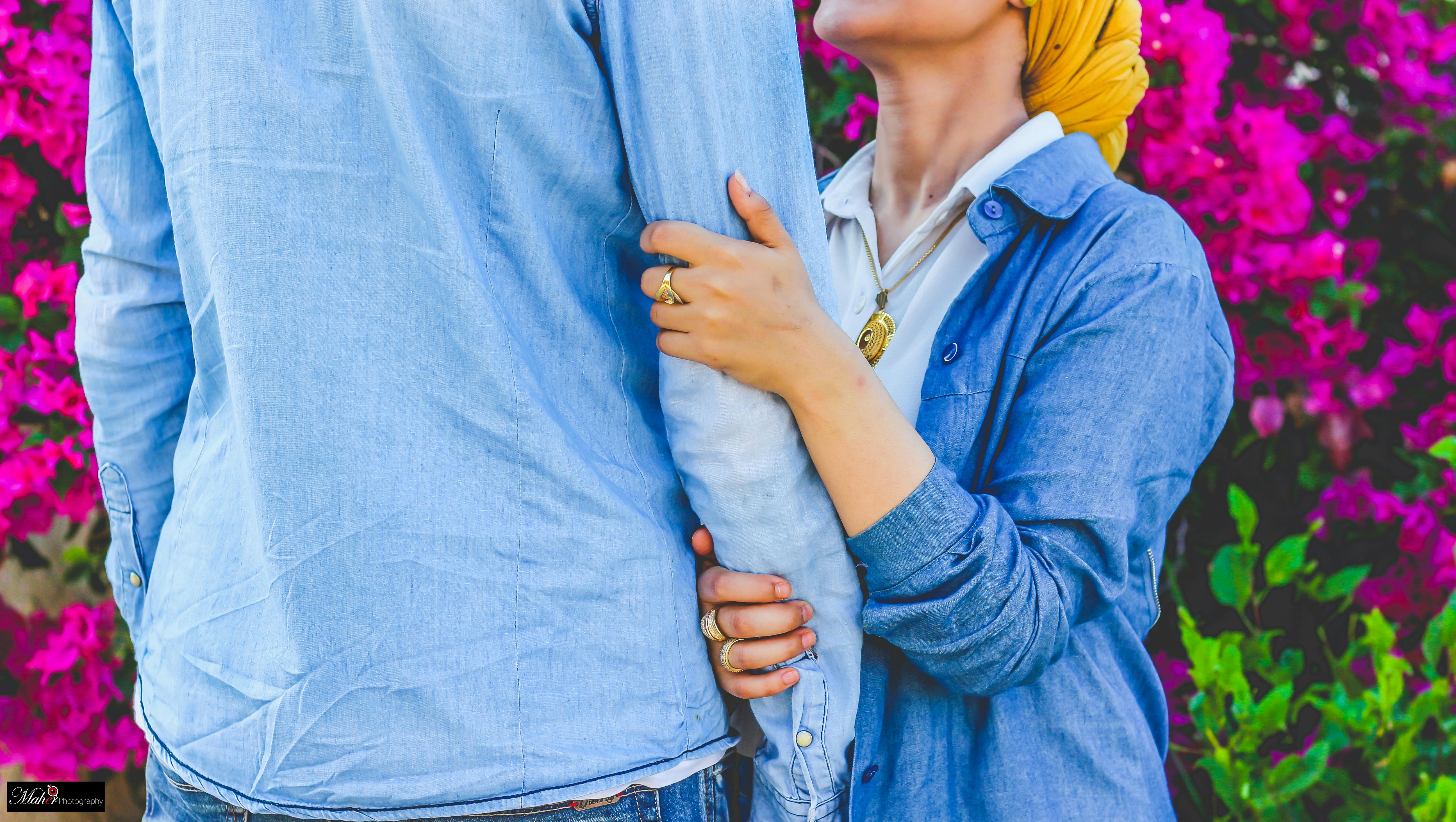 Person Holding Man's Arms · Free Stock Photo