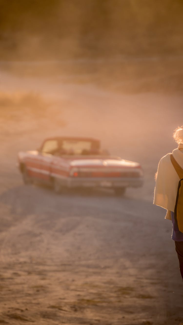 Vintage Car On A Dusty Road