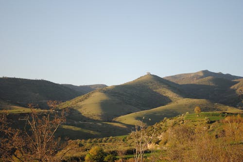 Landscape of Hills under Clear, Blue Sky 