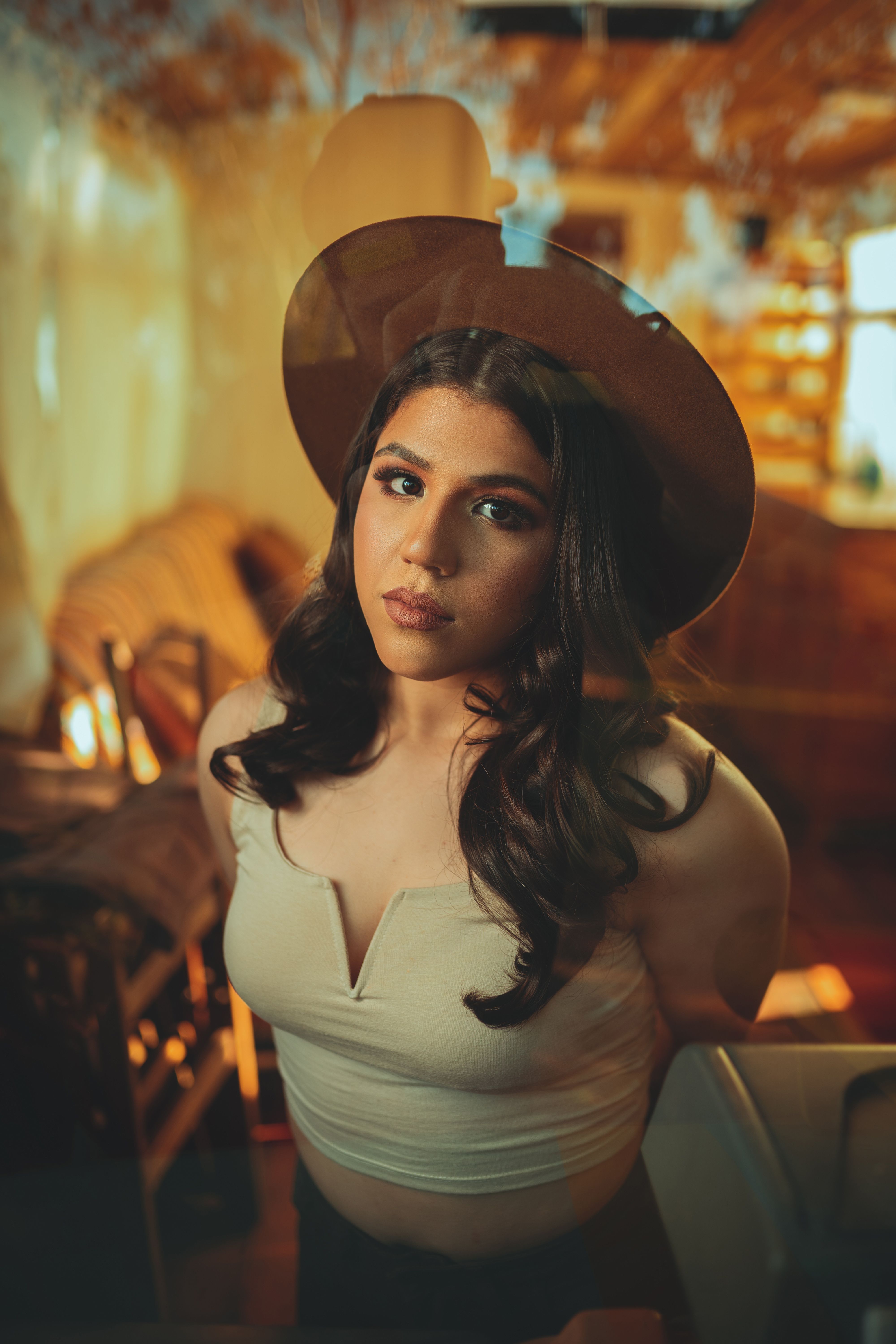 A Woman Wearing Brown Hat · Free Stock Photo