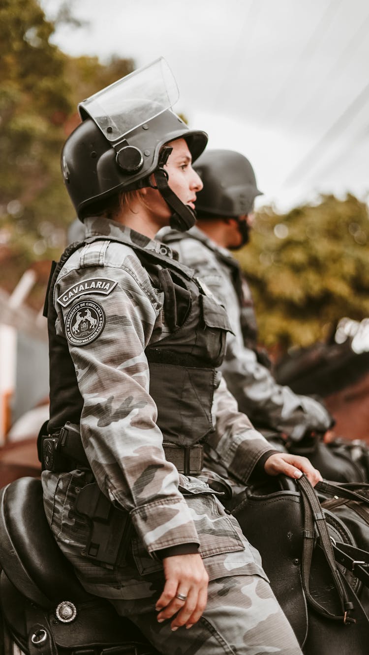 Police Officers Riding Horses