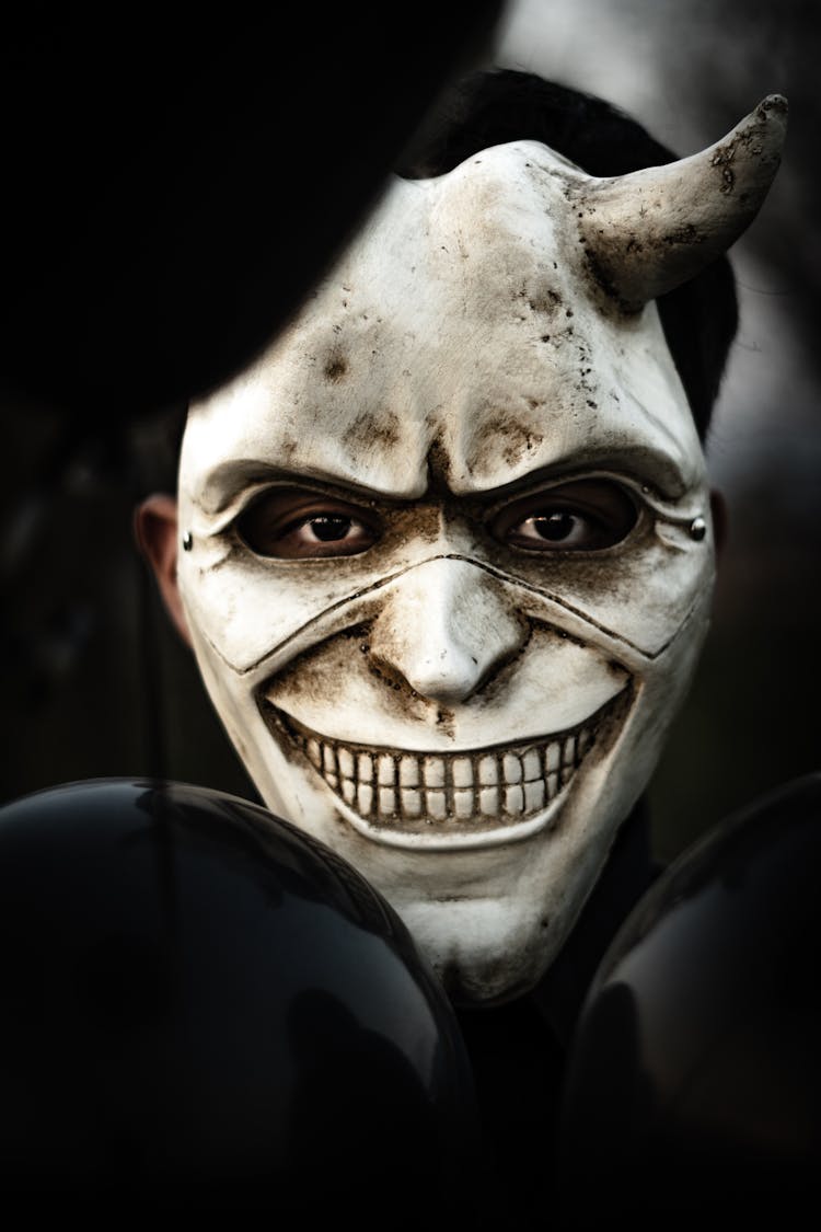 Close-up Of A Person In A Scary Mask