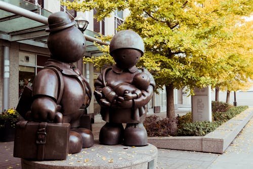 Modern Sculpture of a Family in the City