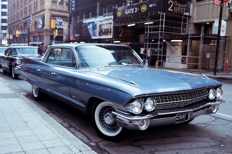 Blue Classic Car Parked On Street