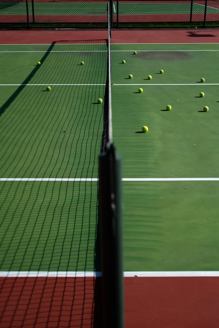 Tennis Balls On A Court 