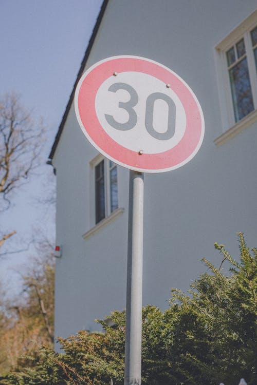 Free Warning Road Sign on Street Stock Photo
