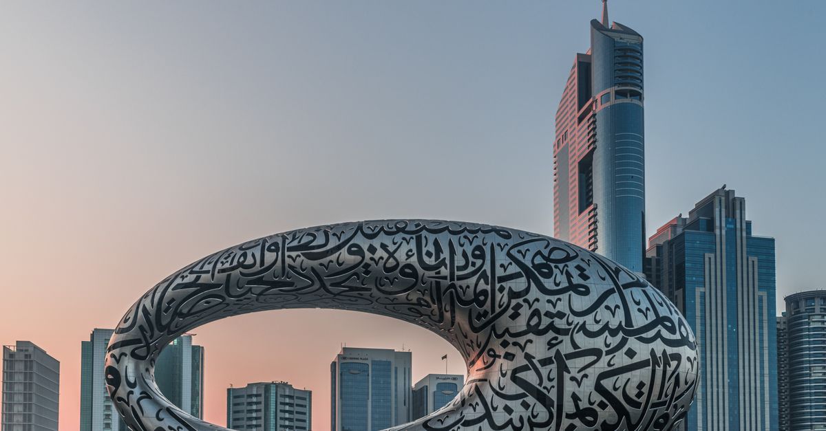 Dubai's skyline featuring Museum of the Future and modern skyscrapers at twilight.