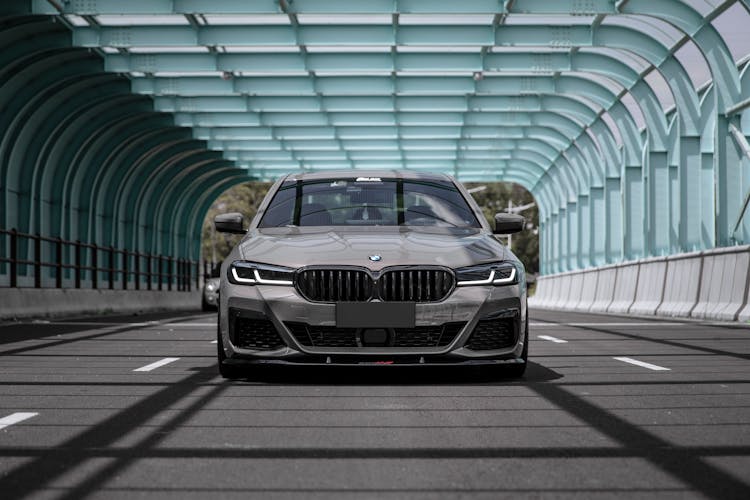 Gray Car Parked At A Bridge