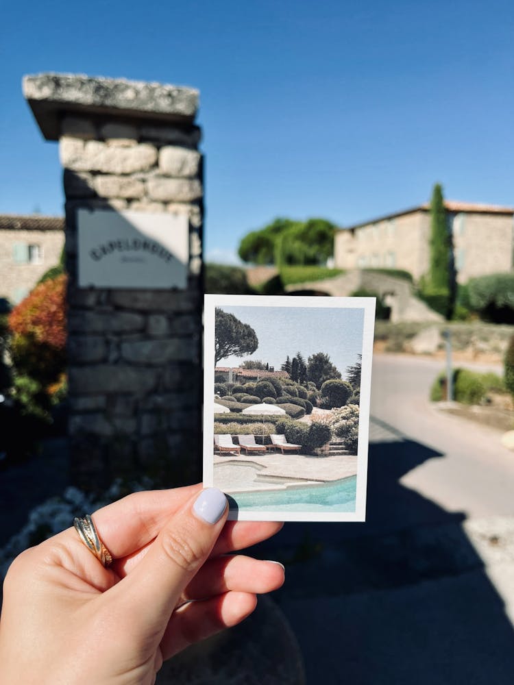 Woman Hand Holding Resort Photo