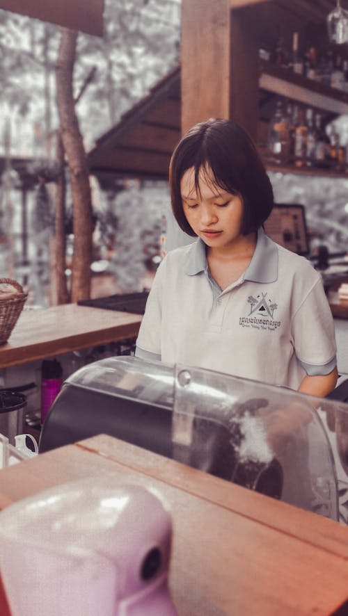 Free Woman Working at a Coffee Shop Stock Photo
