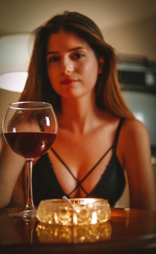 Wine Glass in Front of a Woman