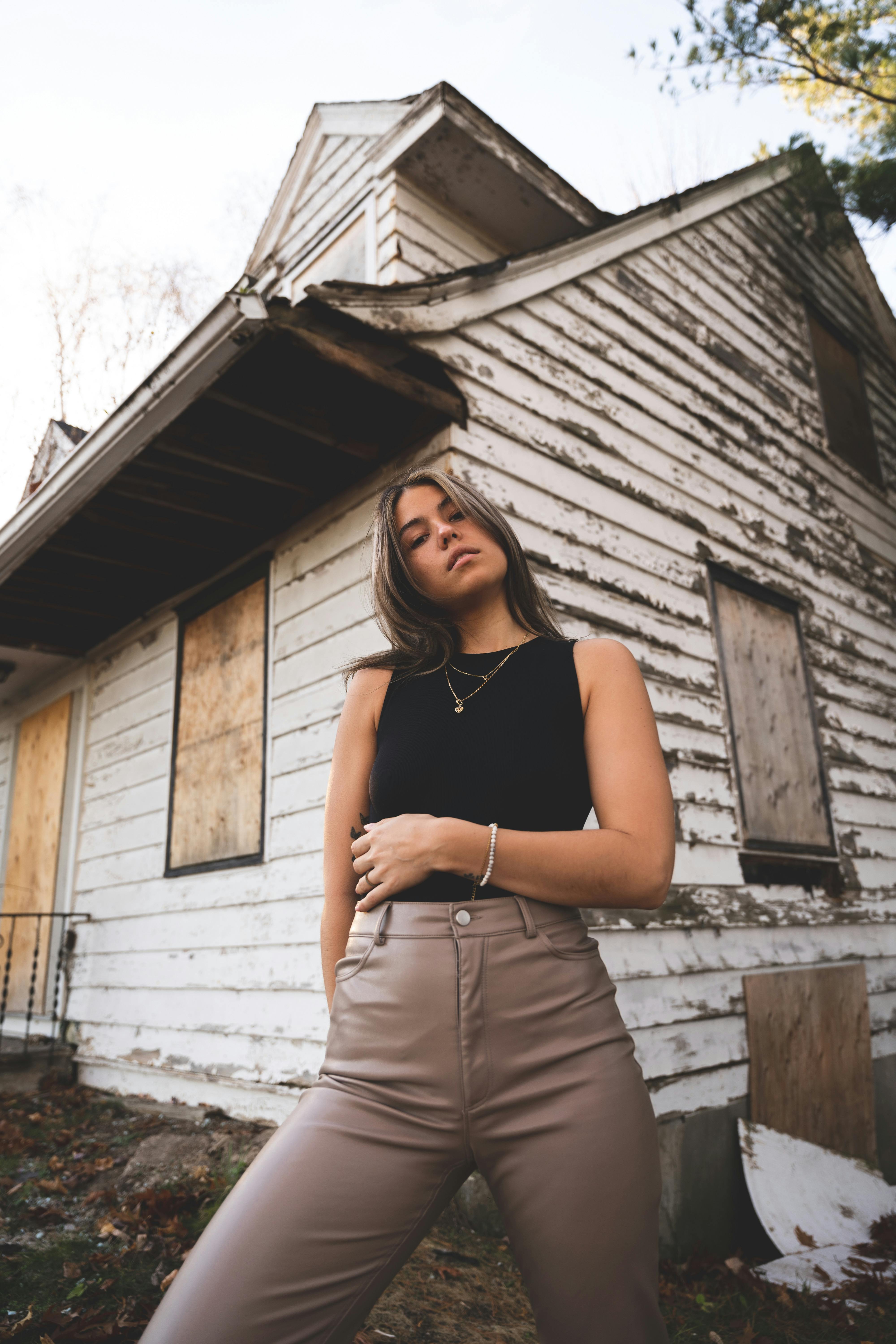 beautiful woman and abandoned house