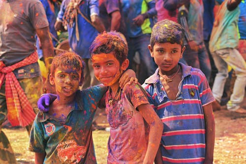 Free Boys at Holi Festival in India Stock Photo