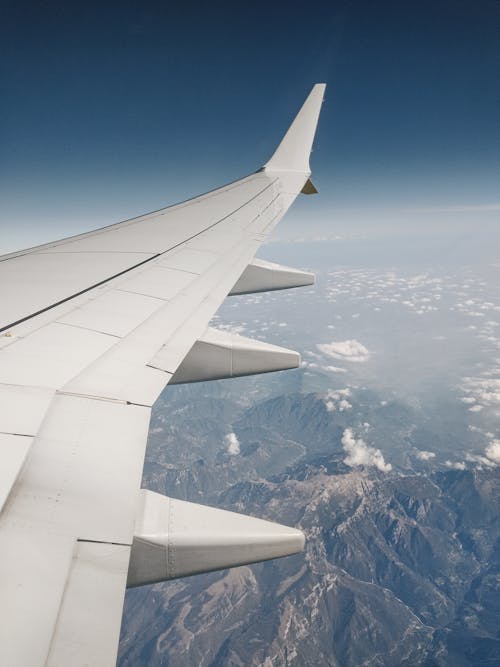 비행기, 비행기 날개, 산의 무료 스톡 사진