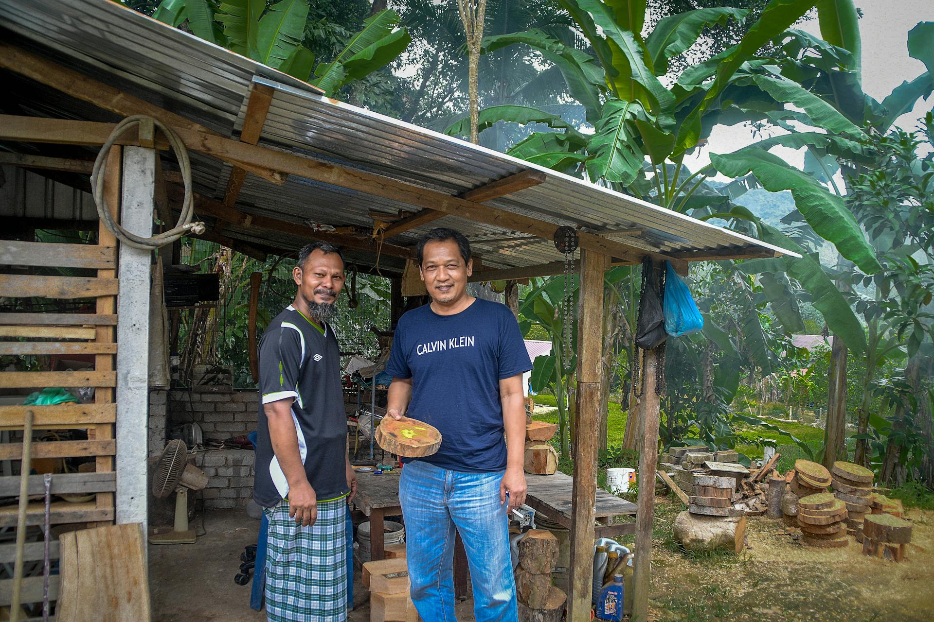 Men Standing under the Garden Shed