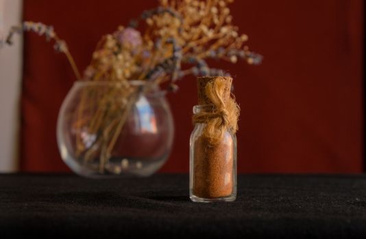 Brown Dried Leaves in Clear Glass Jar