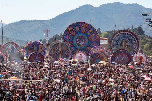 Colorful kites and crowds at the Sumpango Kite Festival in Guatemala.