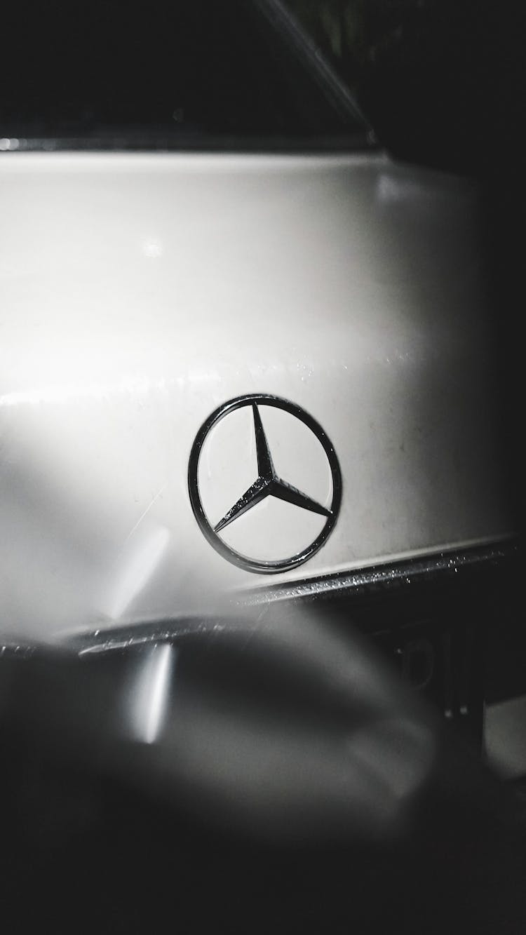 Sign Of Mercedes Benz On A Car Trunk