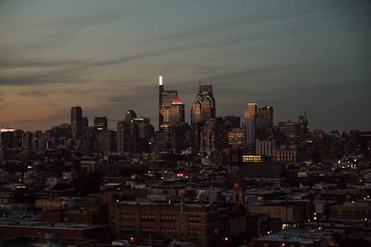 A stunning view of Philadelphia's skyline at twilight, showcasing iconic skyscrapers.