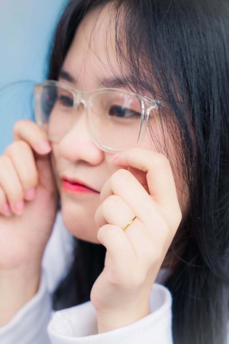 Portrait Of Woman Wearing Transparent Rim Glasses