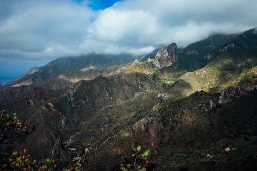 Free Scenic view of Tenerife's rocky landscape with clouds and valleys. Stock Photo