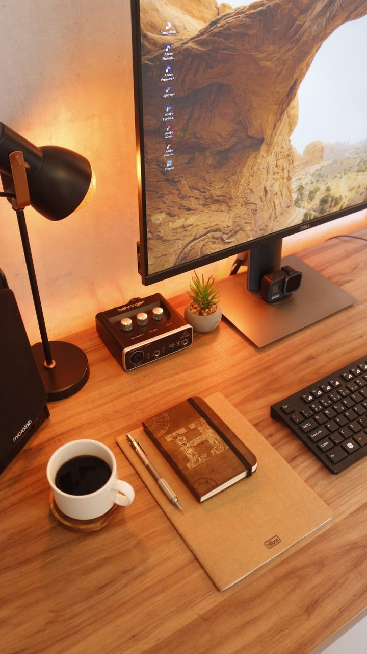 armoire combining a drop down desk and coffee bar for home offices