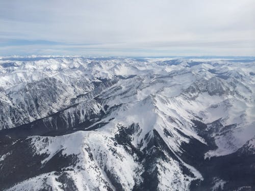 Mountain Valley Covered with Snow 