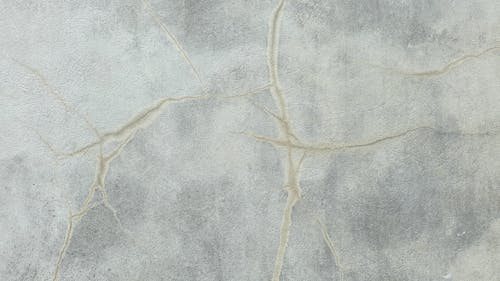 Cracks on a Gray Wall