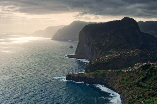 Aerial Photography of Mountains near Ocean