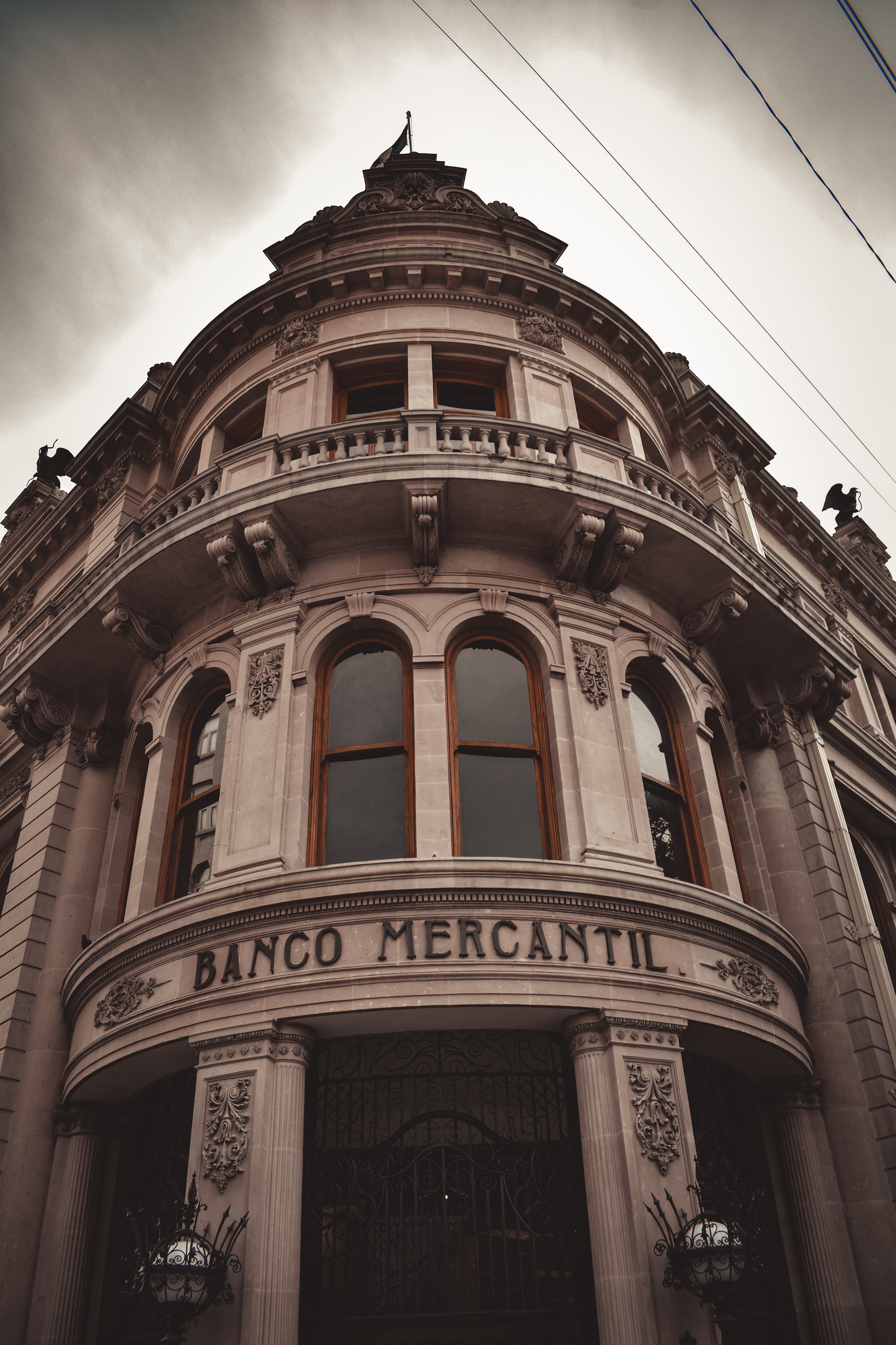 A classic architectural facade of Banco Mercantil in Monterrey, Mexico.