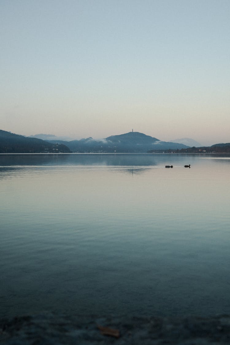 Body Of Water Near Mountain