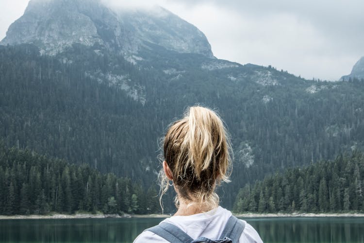 A Woman Looking At The Mountain