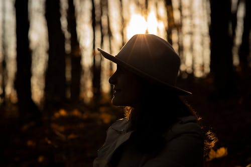 Silhouette of Woman Wearing Hat