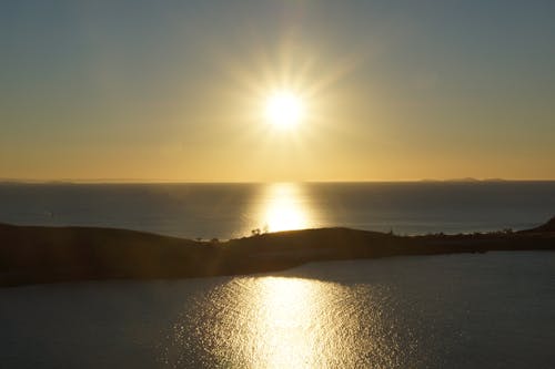 Aerial Photography of an Island during Sunset