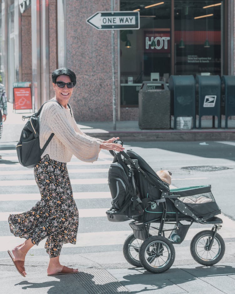 Middle-aged Woman Pushing A Trolley