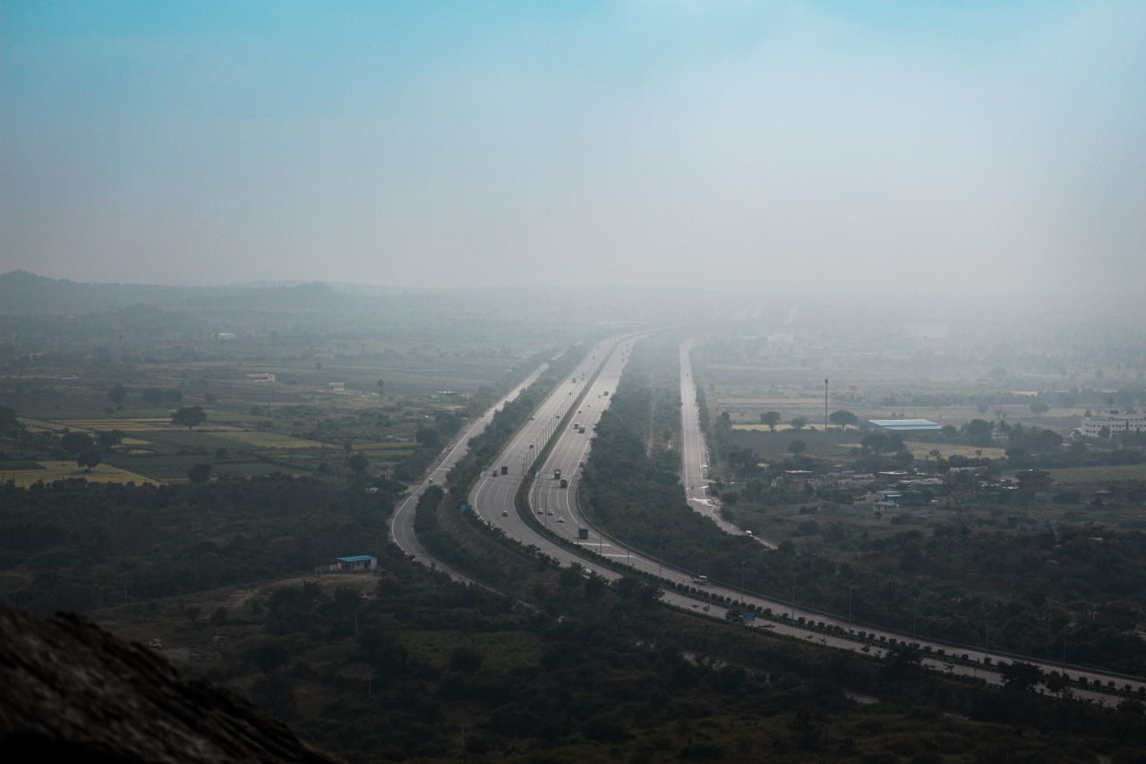 drone shot of a highway in hyderabad showcasing transportation and inf