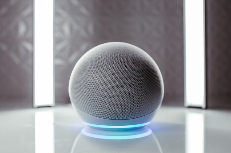 Close-Up Photo Of Gray Round Speaker