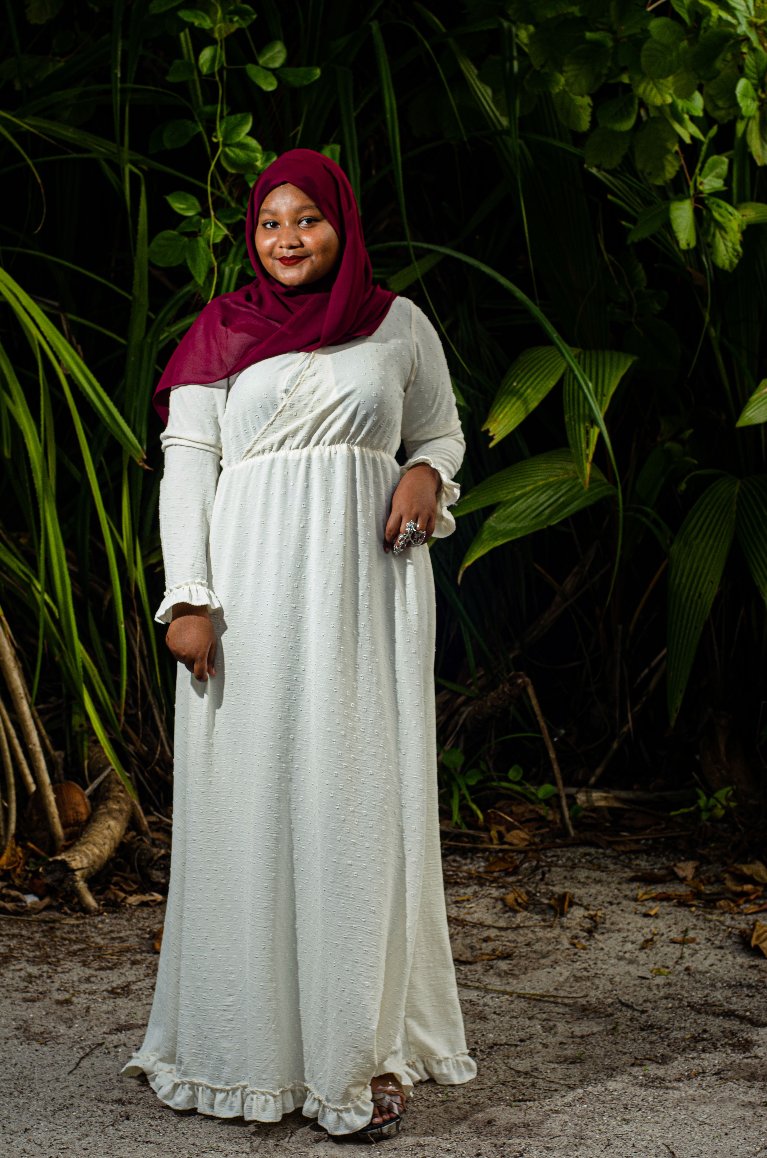 A Woman in Red Hijab and White Dress · Free Stock Photo