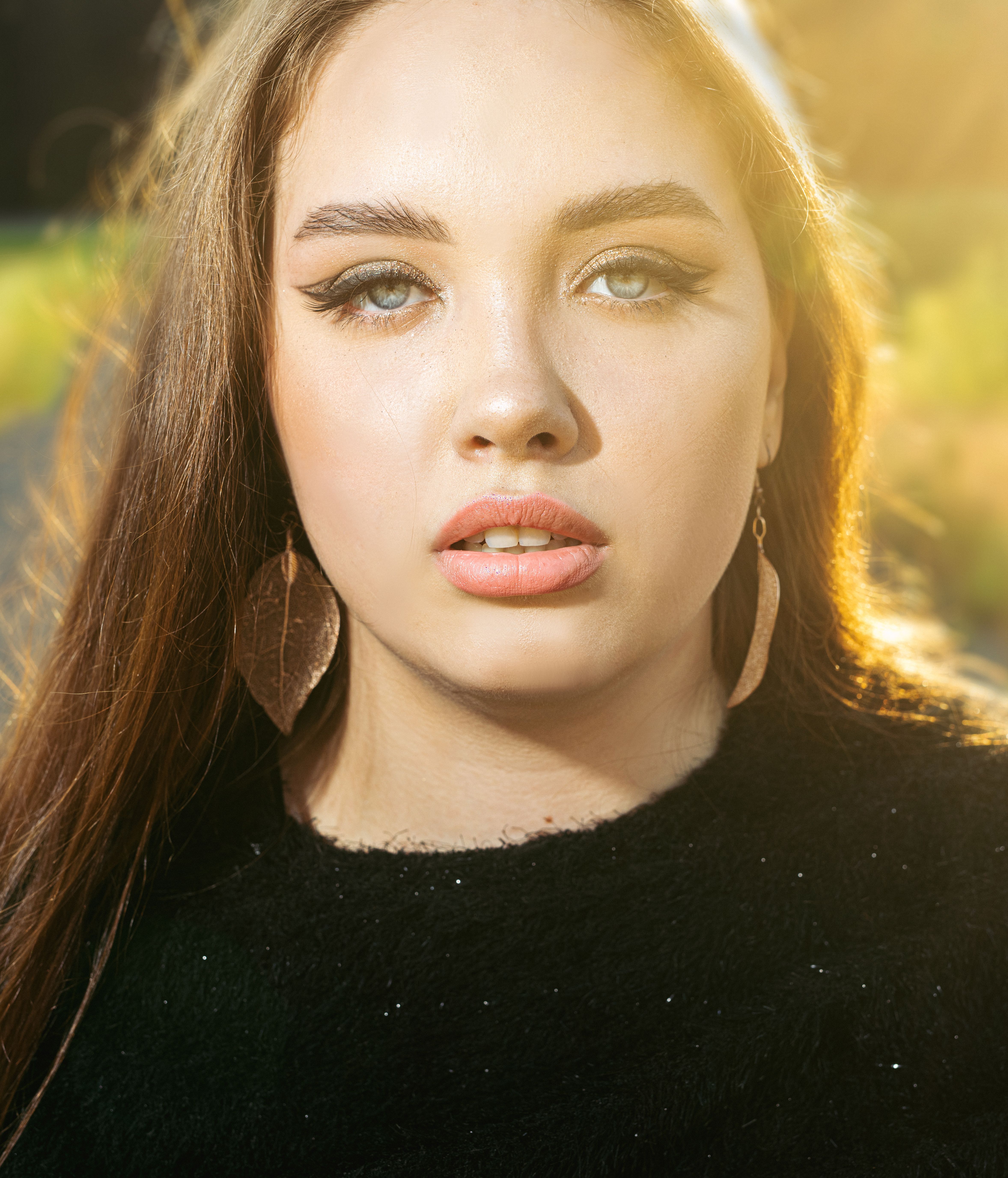 A Portrait of a Woman in Black Shirt · Free Stock Photo