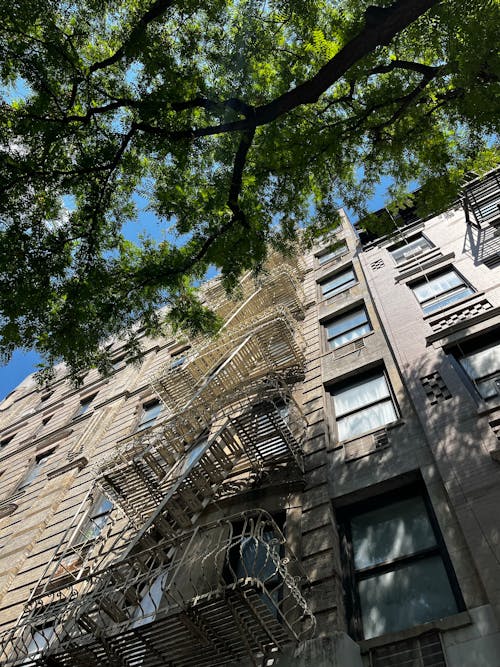 Low Angle Shot of a Block of Flats with an Outside Staircase 